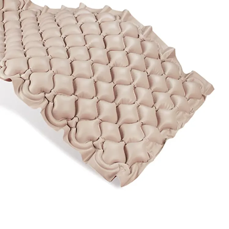 Close view of beige mattress cells