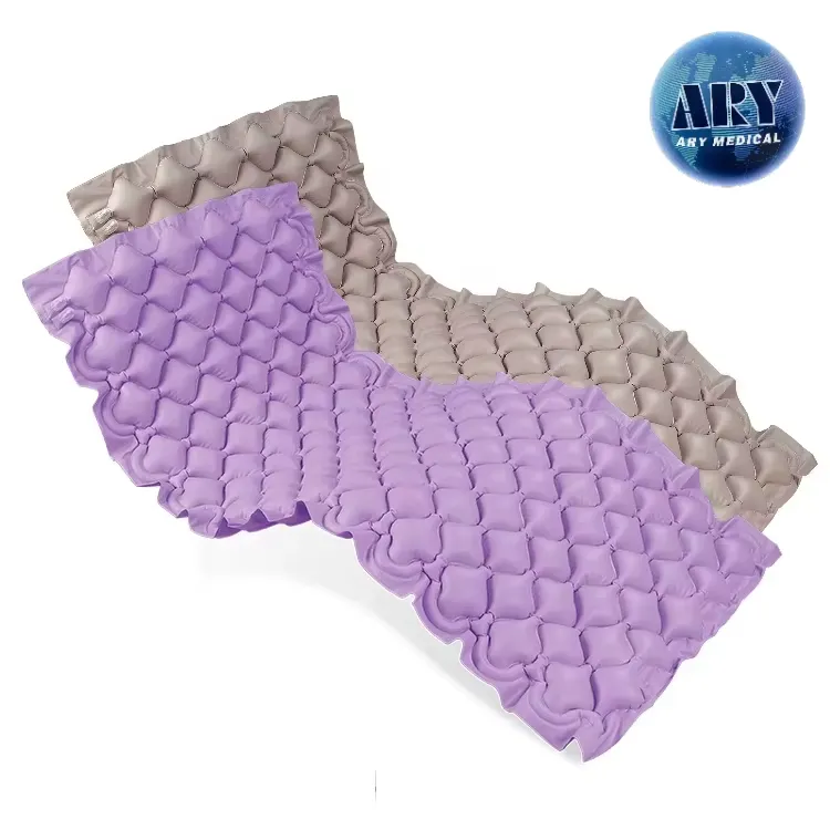 Beige and purple bubble-style mattress variants in the product range