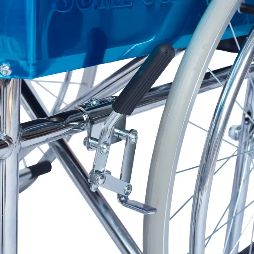 Existing AryMD 809 manual wheelchair photograph showing wheel-lock lever close-up
