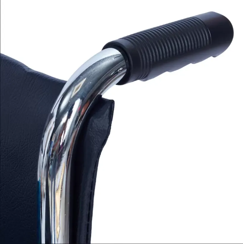 Existing AryMD 809 manual wheelchair photograph showing push handle grip close-up