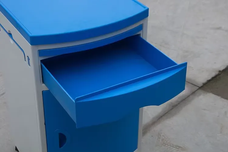 Bedside cabinet with its blue drawer open