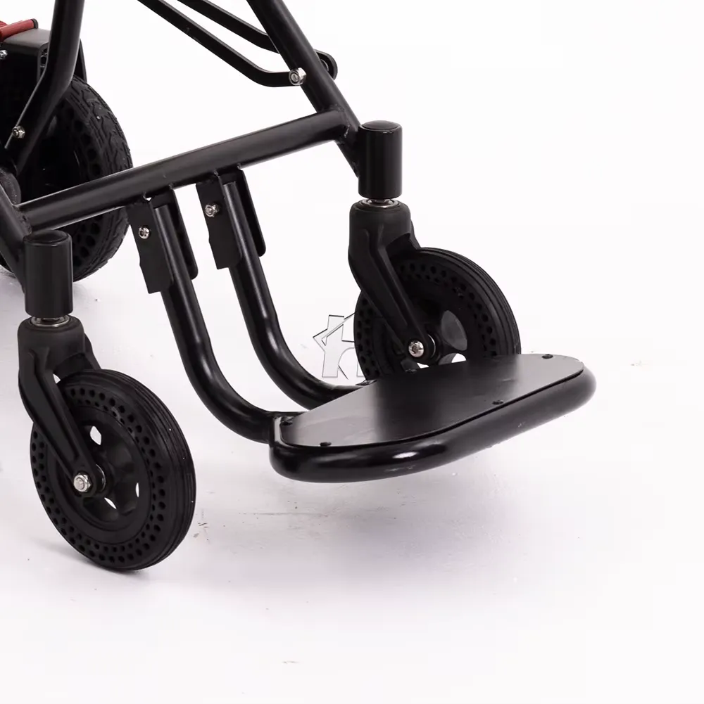 Product detail showing front casters and foot support on the black chair