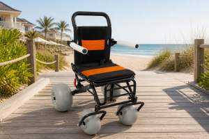 Lightweight beach wheelchair at a resort boardwalk entrance