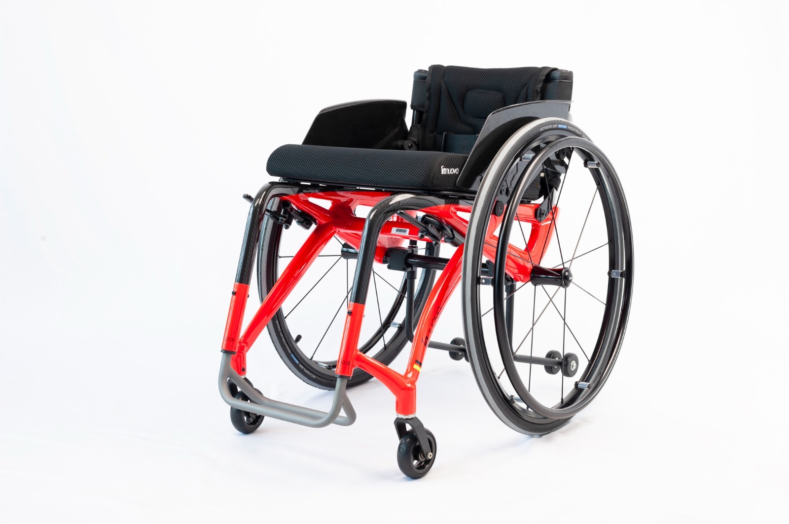 Carbon fibre manual wheelchair buyer review using a supplied red sports manual chair as a visual reference
